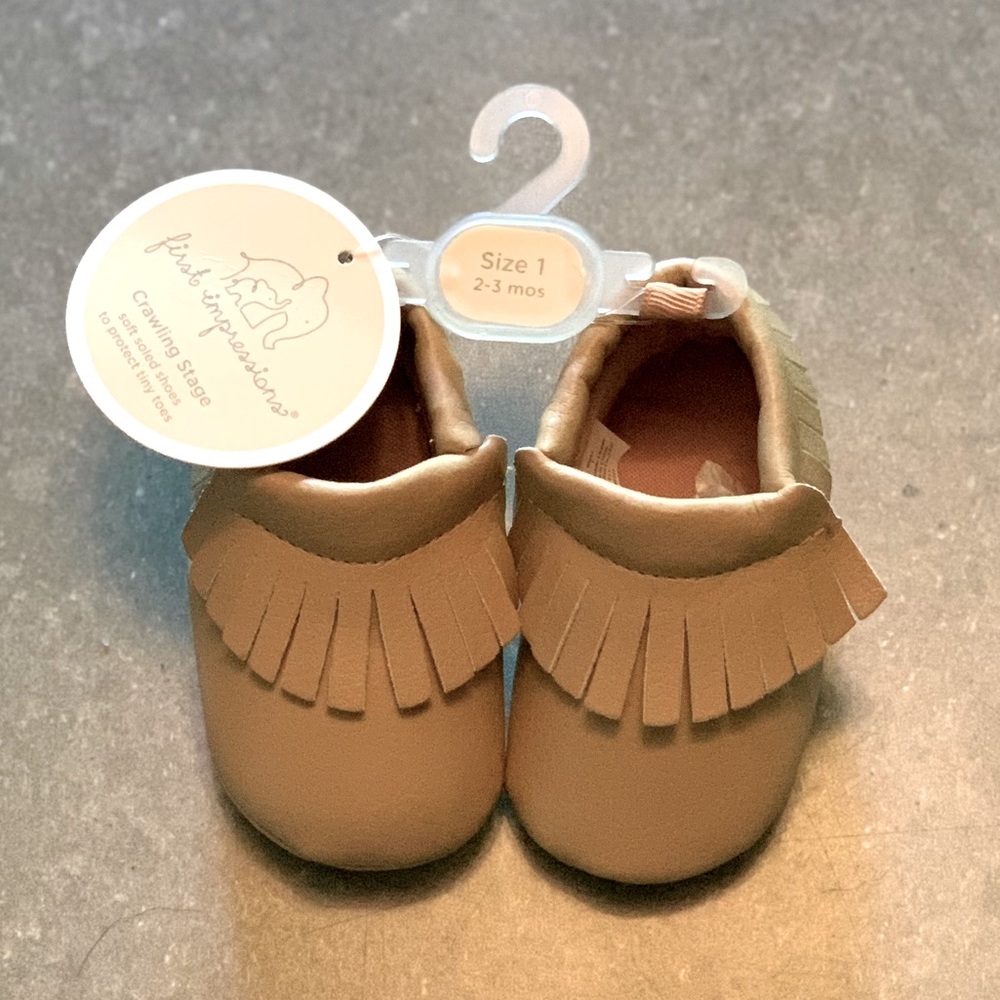 First Impressions Infant moccasins. NWT.